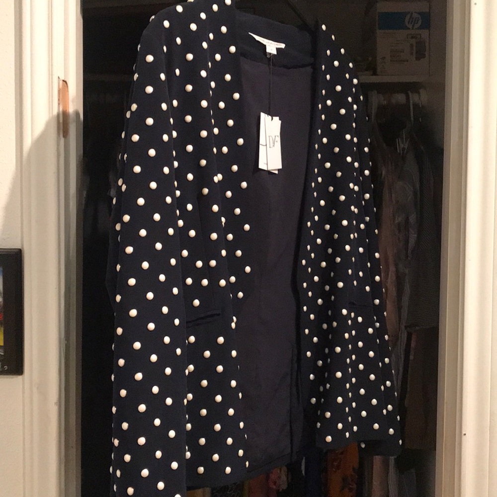 A size 12 navy blazer with pearl details